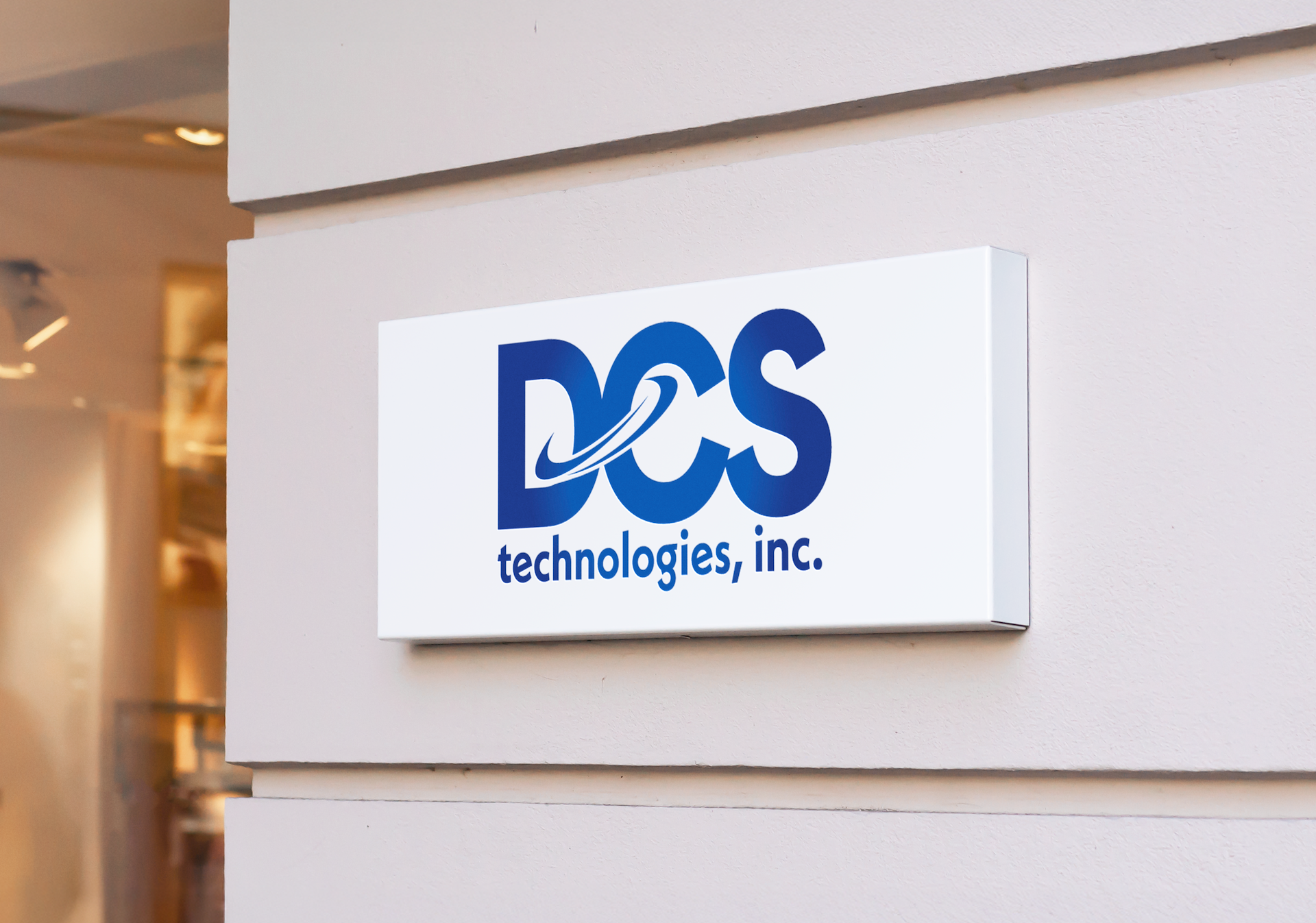 DCS Technologies logo visualized on a building wall as an environmental branding concept